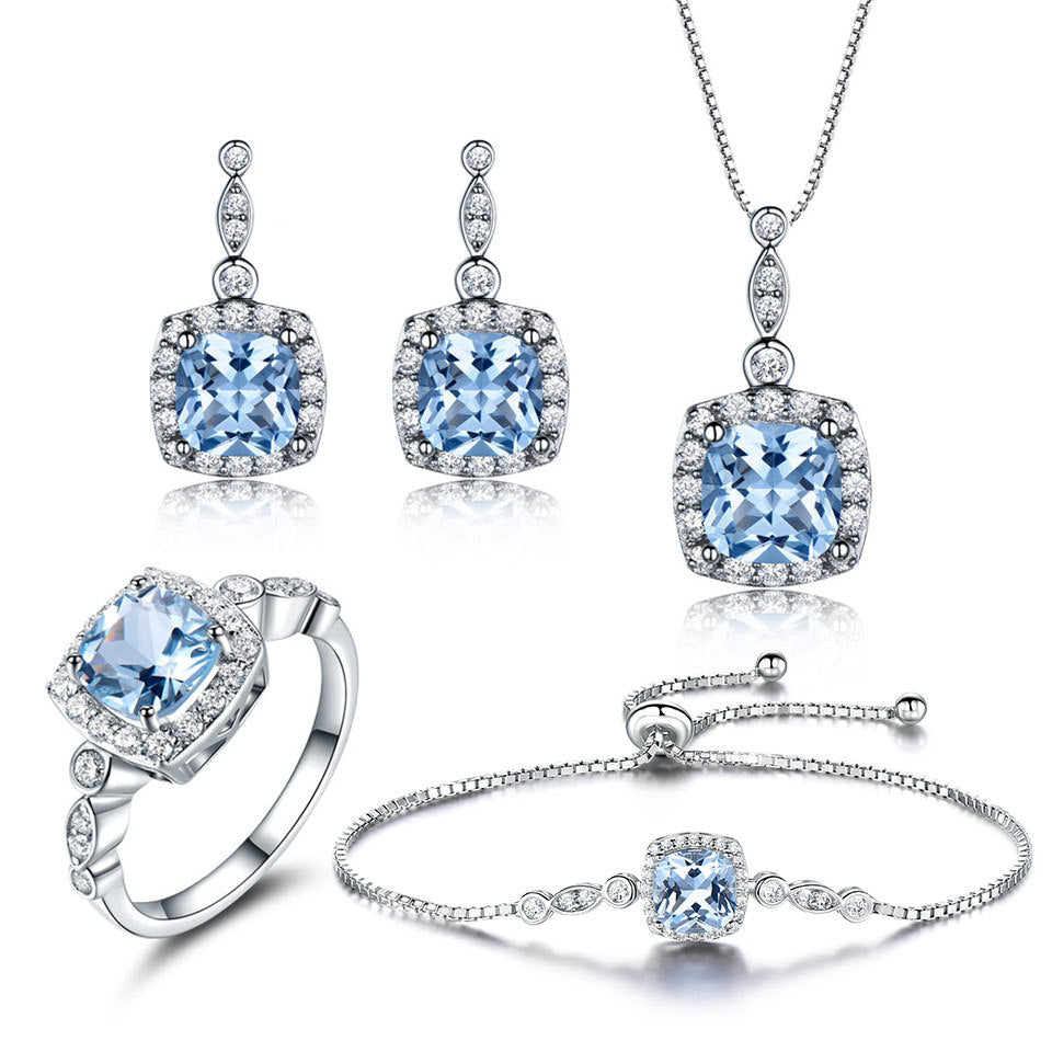 4-Piece Sky Blue Topaz Jewelry Set | 925 Sterling Silver Necklace, Earrings, Ring & Bracelet | Luxurious Gemstone Bridal Set for Women